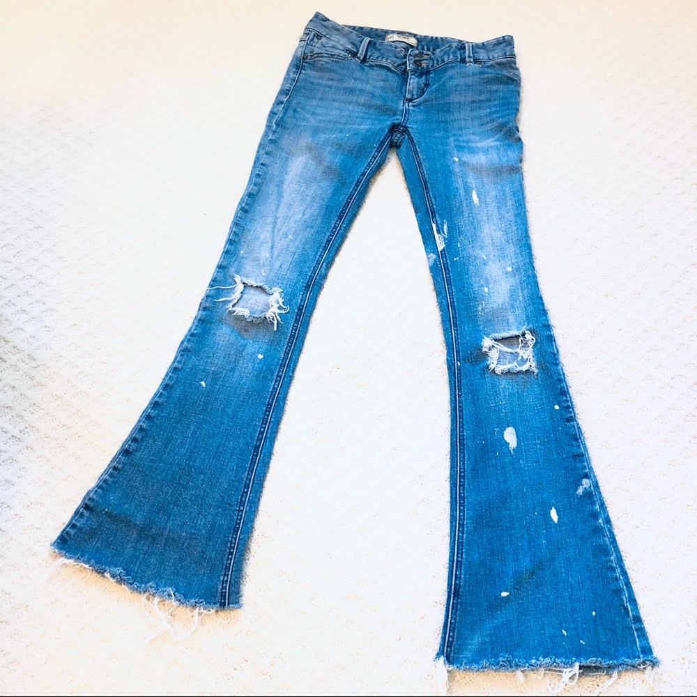 FREE PEOPLE DISTRESSED PAINTED FLARE JEANS